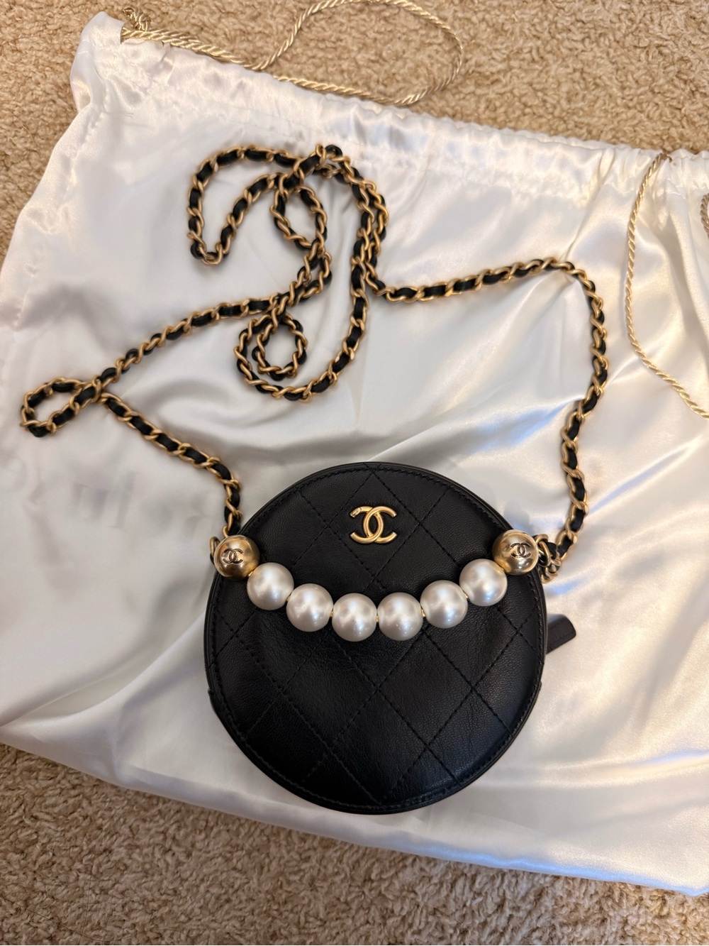 CHANEL Black Quilted Round Mini Crossbody with Pearls & Gold Chain